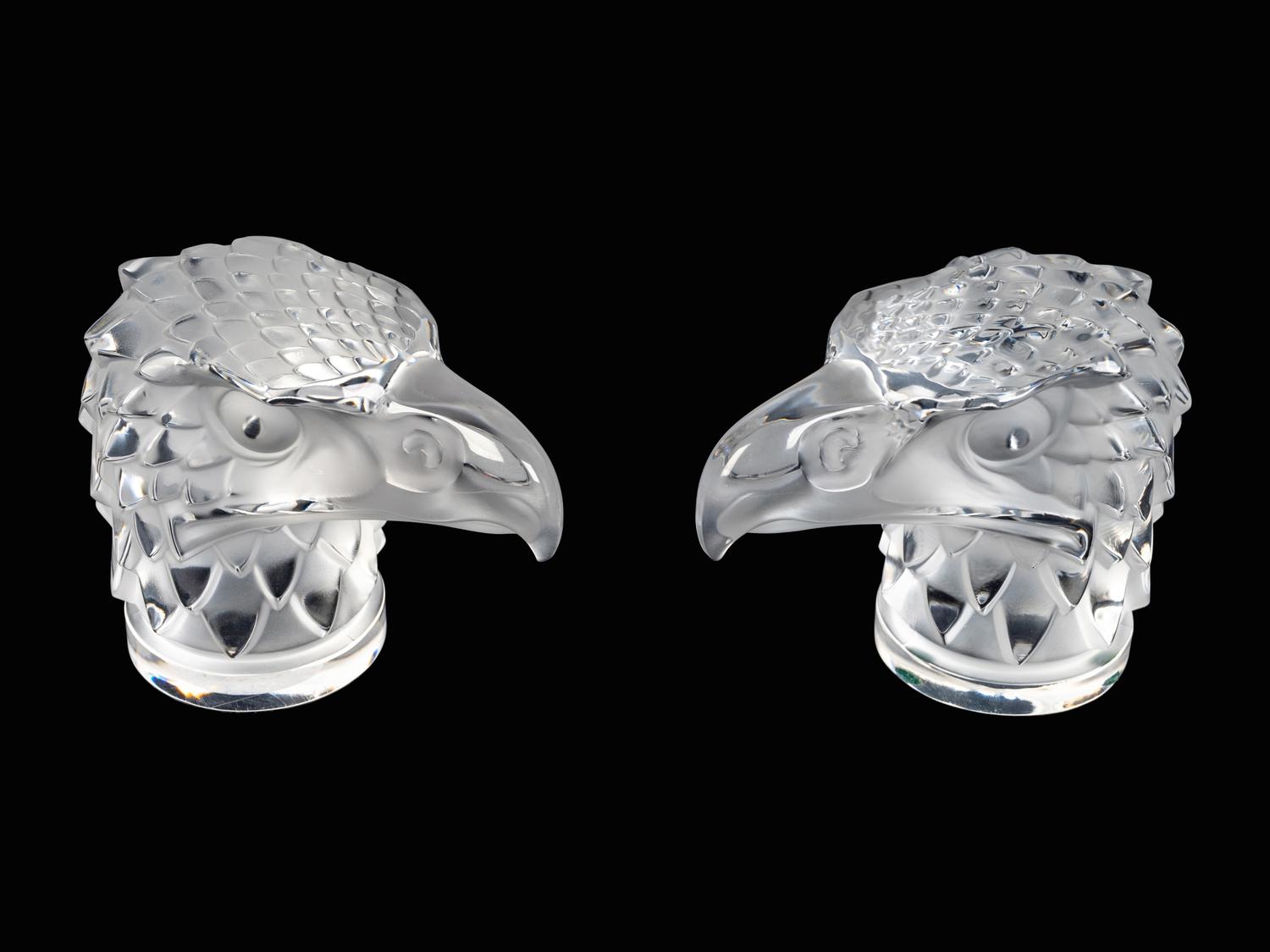 Two Lalique Glass Paperweights: Tete d'Aigle — 20TH/21ST CENTURY