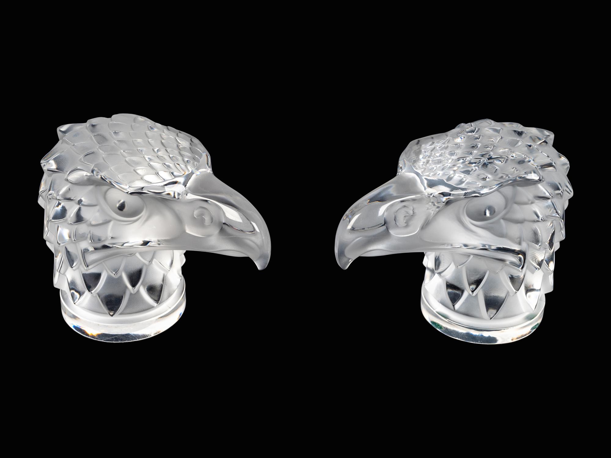 Two Lalique Glass Paperweights: Tete d'Aigle — 20TH/21ST CENTURY