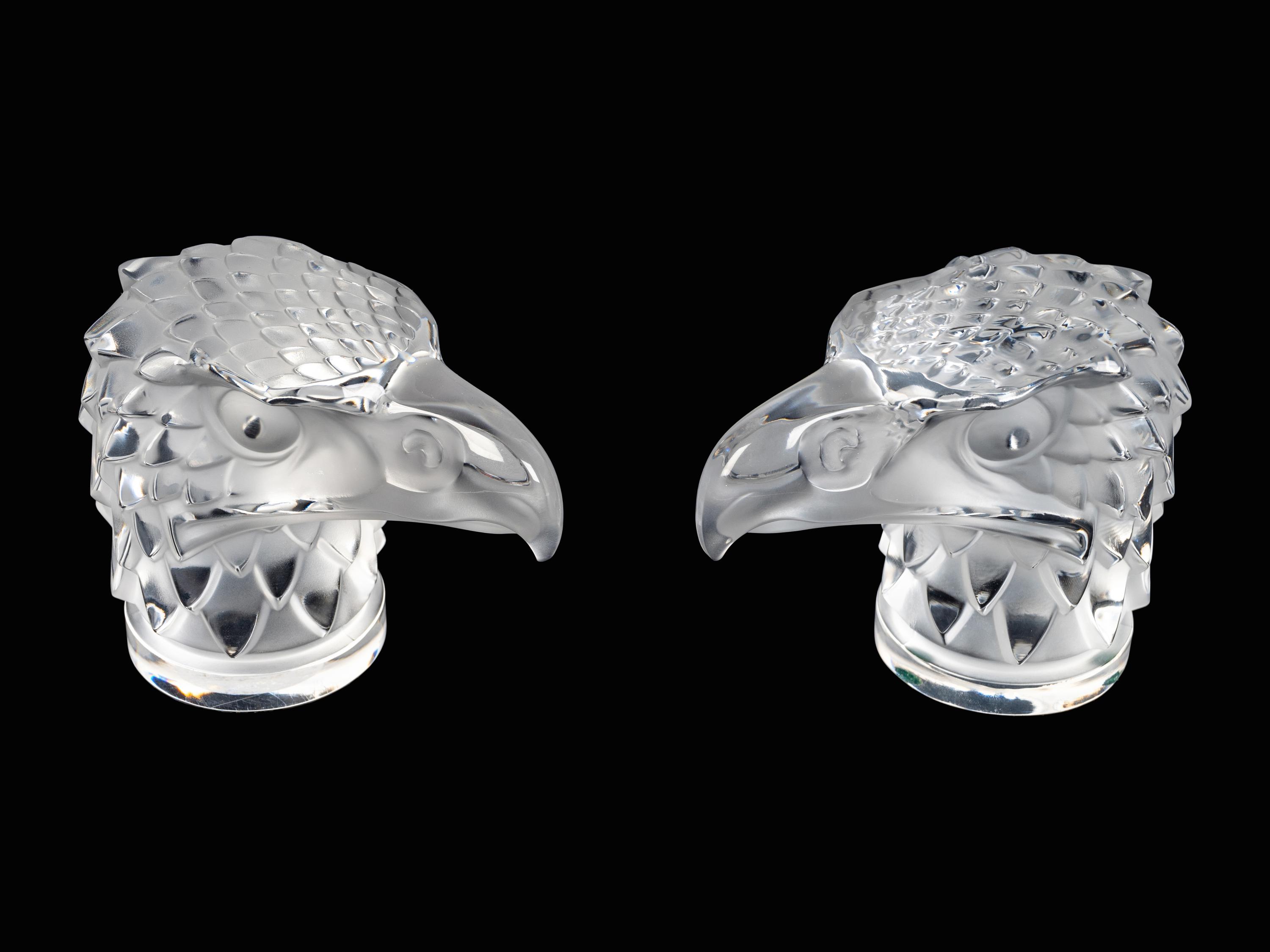 Two Lalique Glass Paperweights: Tete d'Aigle — 20TH/21ST CENTURY