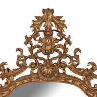 An Italian Rococo Style Giltwood Mirror