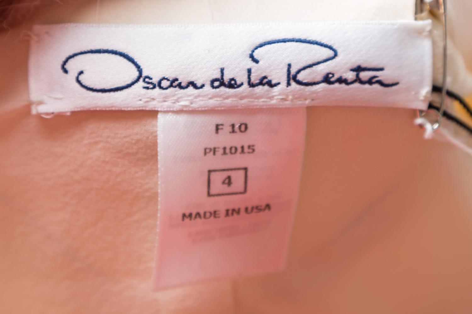 An Oscar de la Renta Cream Fox and Long Hair Mink Apres Ski Jacket, Size 4.