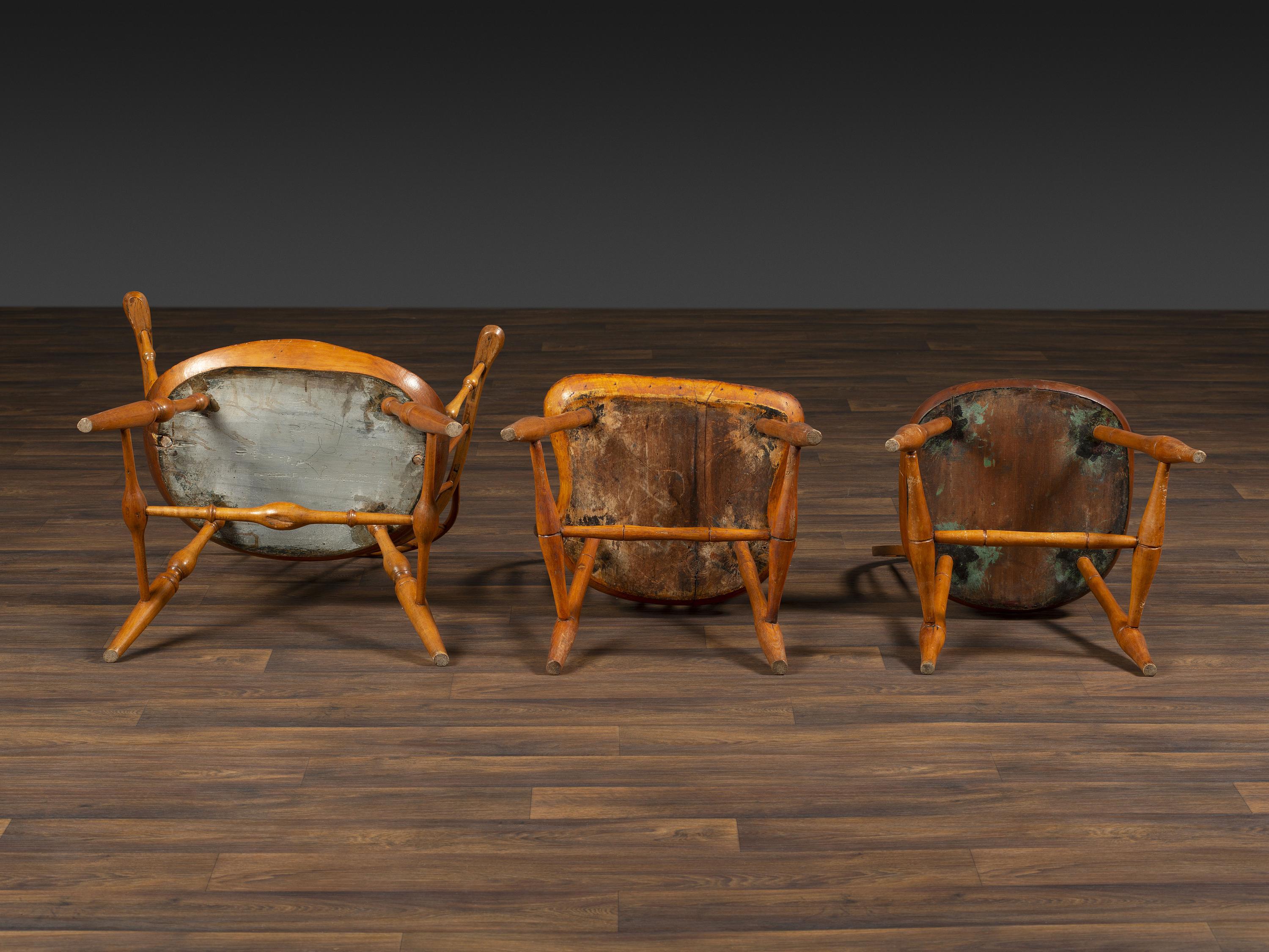 Eleven Primitive Windsor Chairs