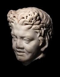 A Roman Marble Satyr Head