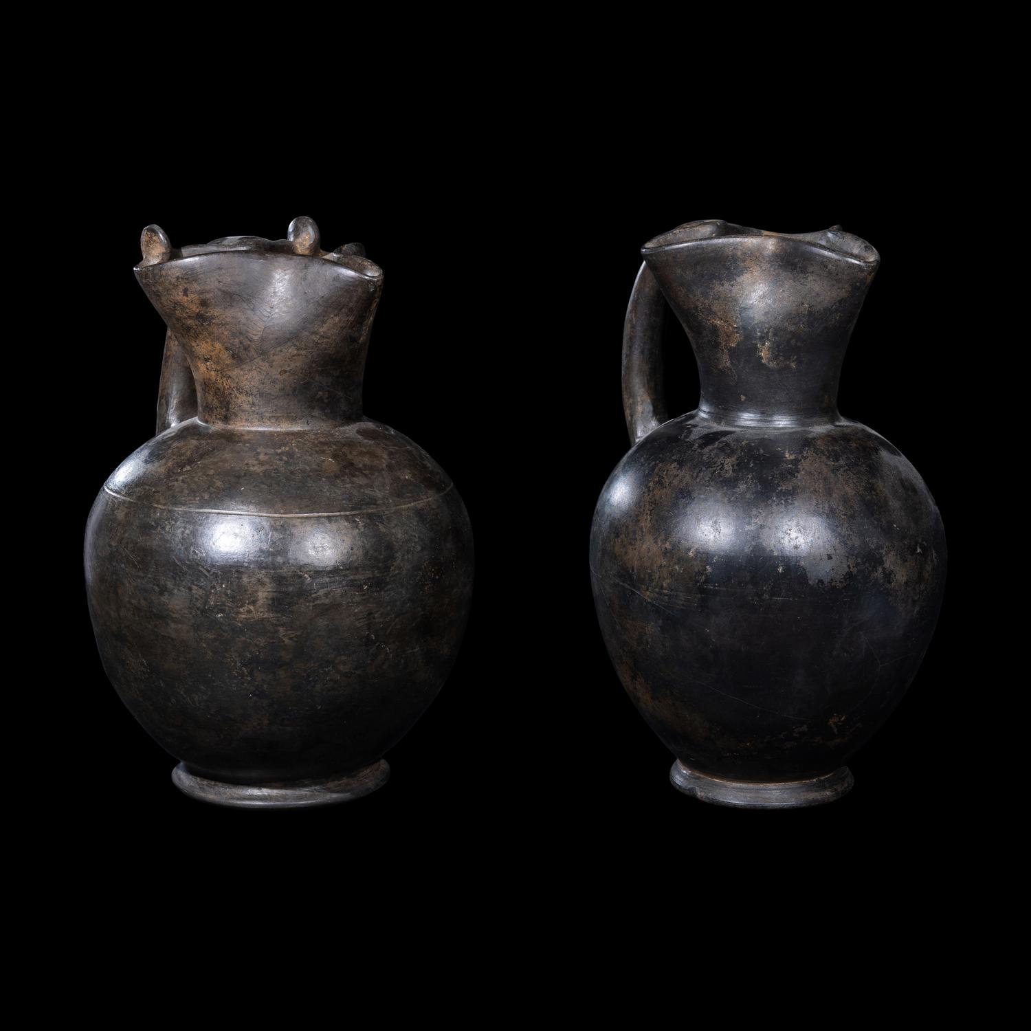 Two Etruscan Bucchero Oinochoai