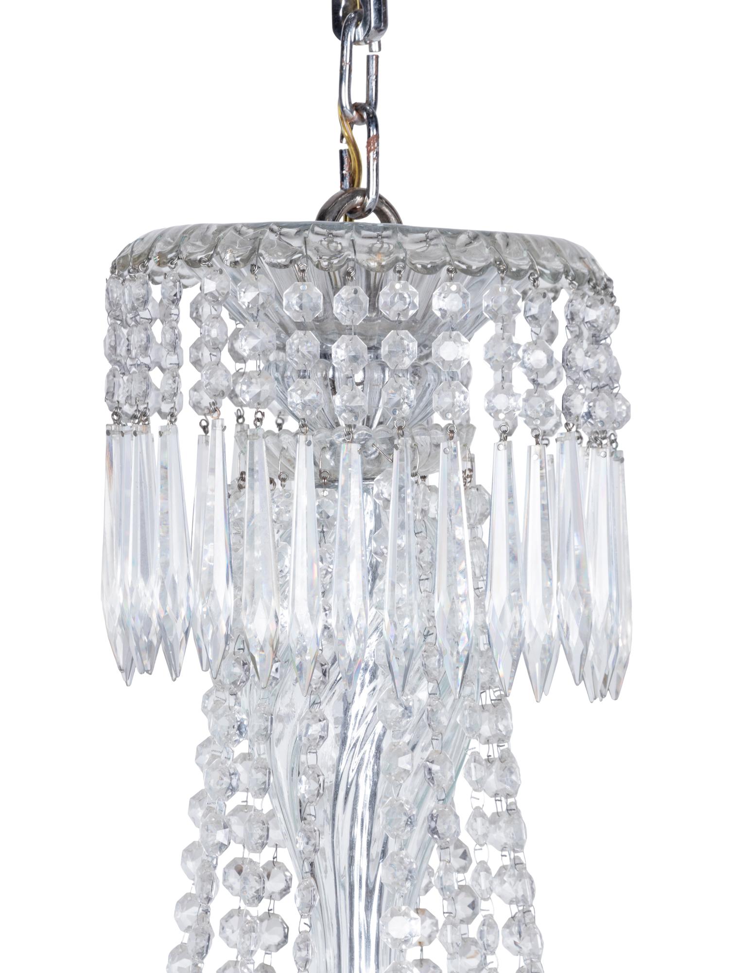 A Pair of Cut Glass Sixteen-Light Chandeliers