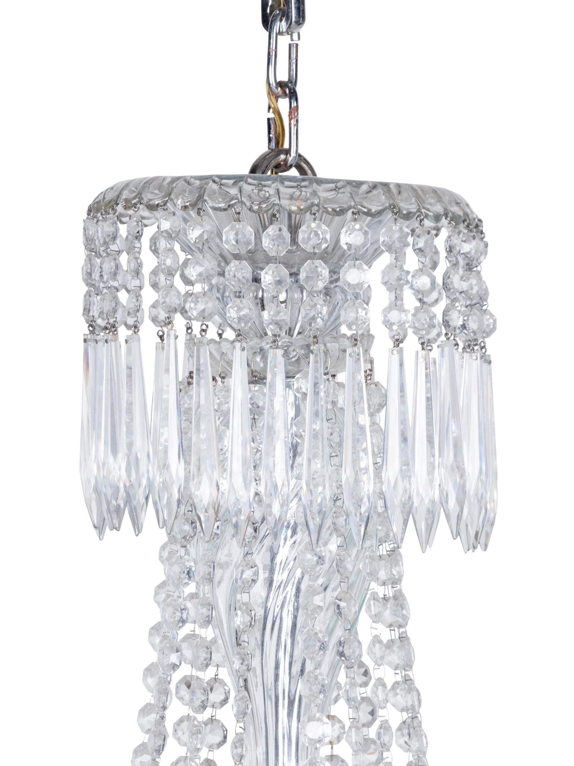 A Pair of Cut Glass Sixteen-Light Chandeliers