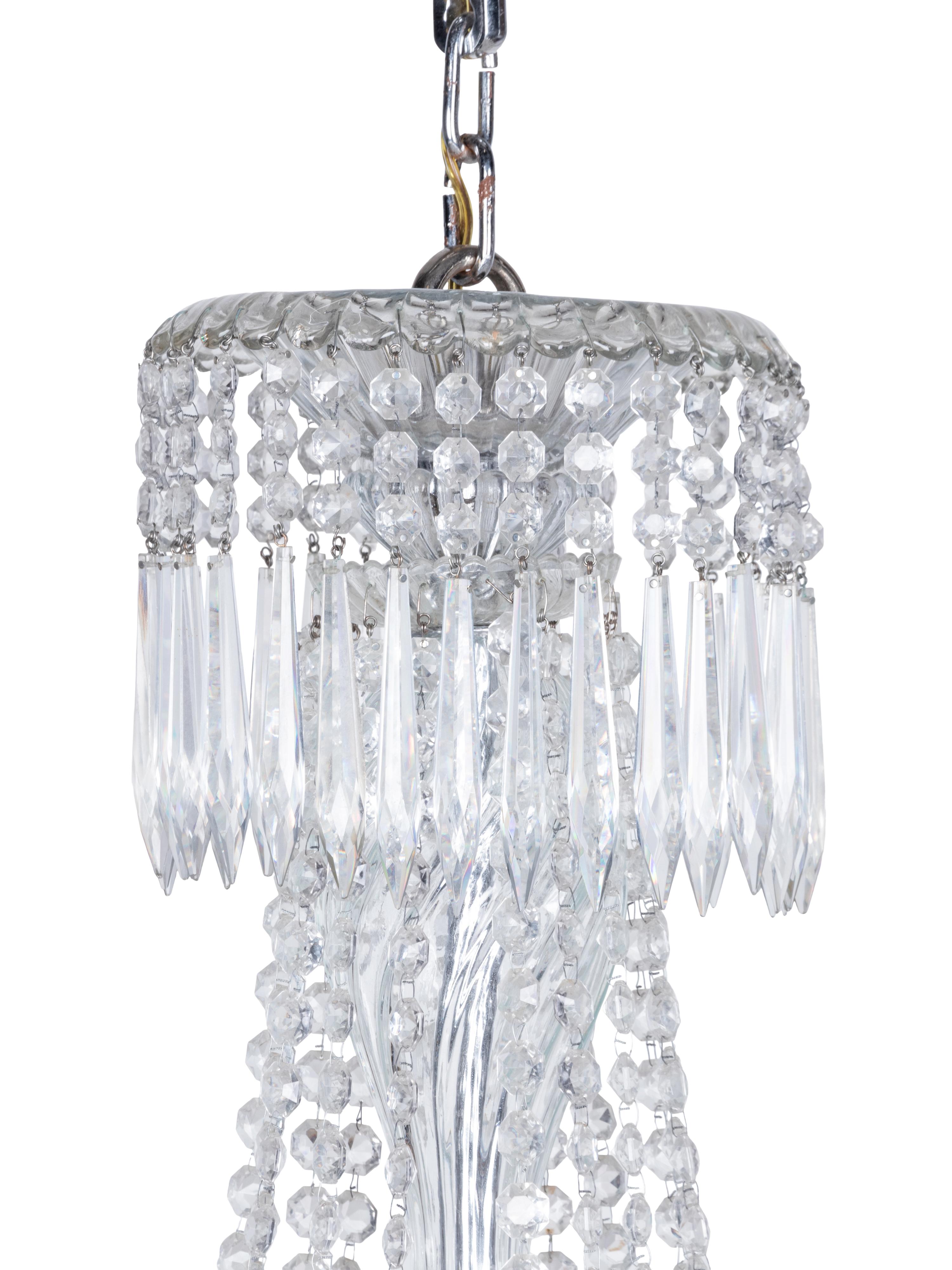 A Pair of Cut Glass Sixteen-Light Chandeliers