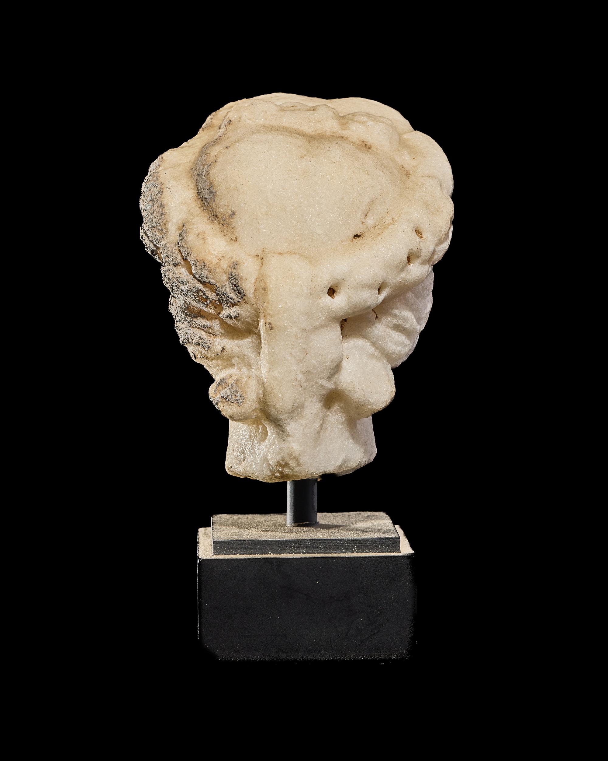 A Roman Marble Head of a Woman