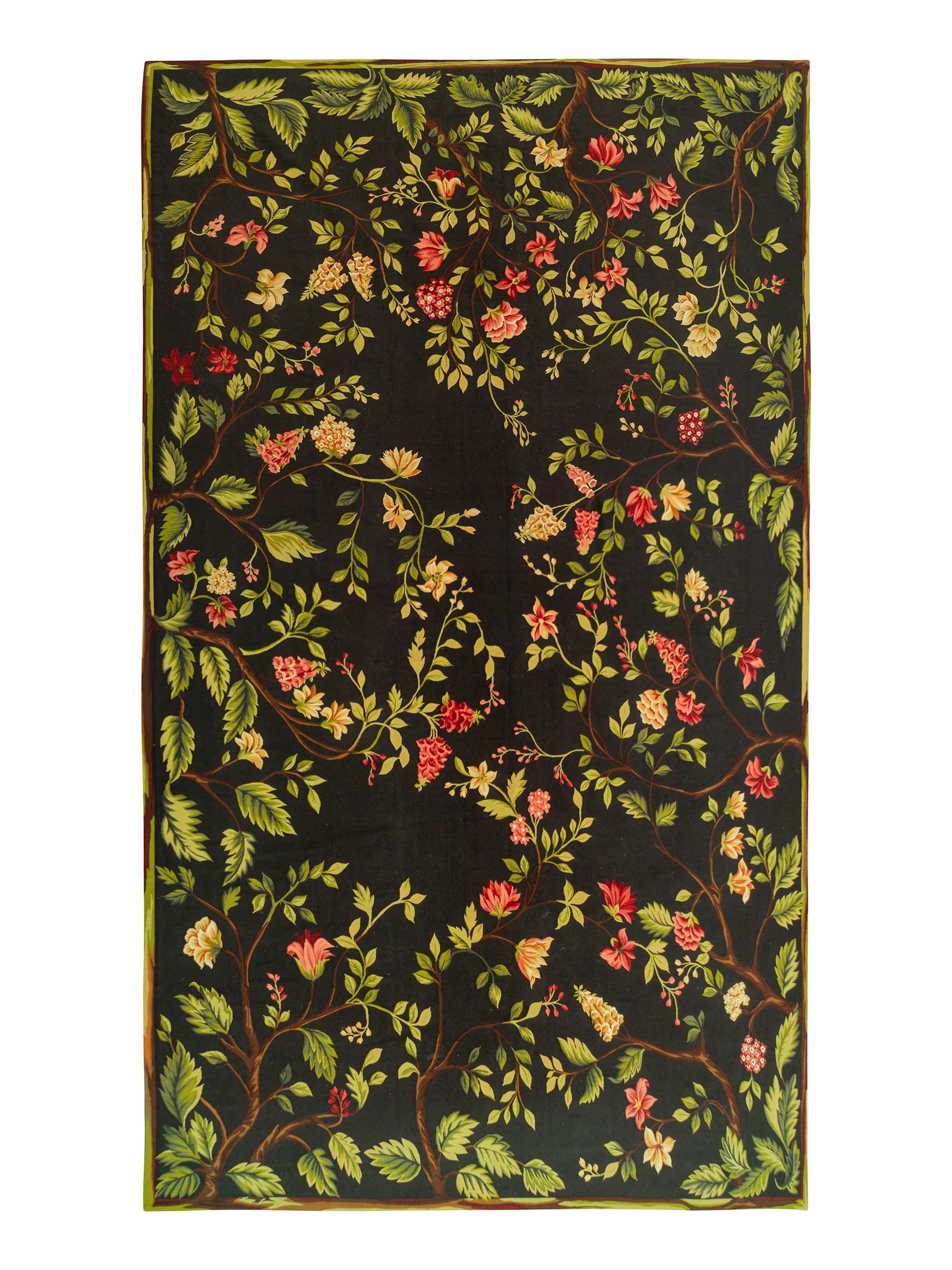 A Large Floral and Foliate Patterned Woven Carpet