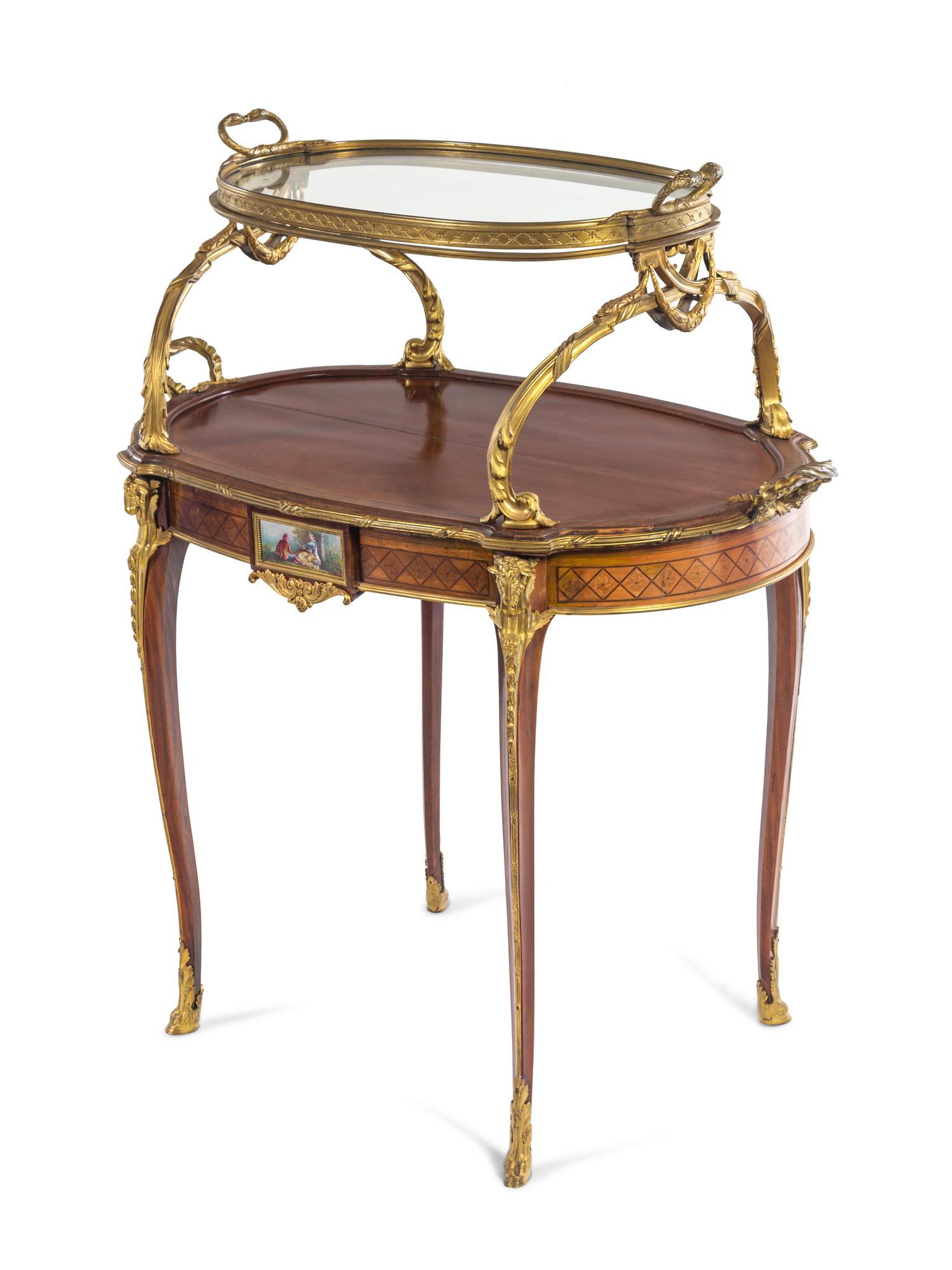 A Louis XV Style Gilt Bronze and Porcelain Mounted Two-Tier Serving Table