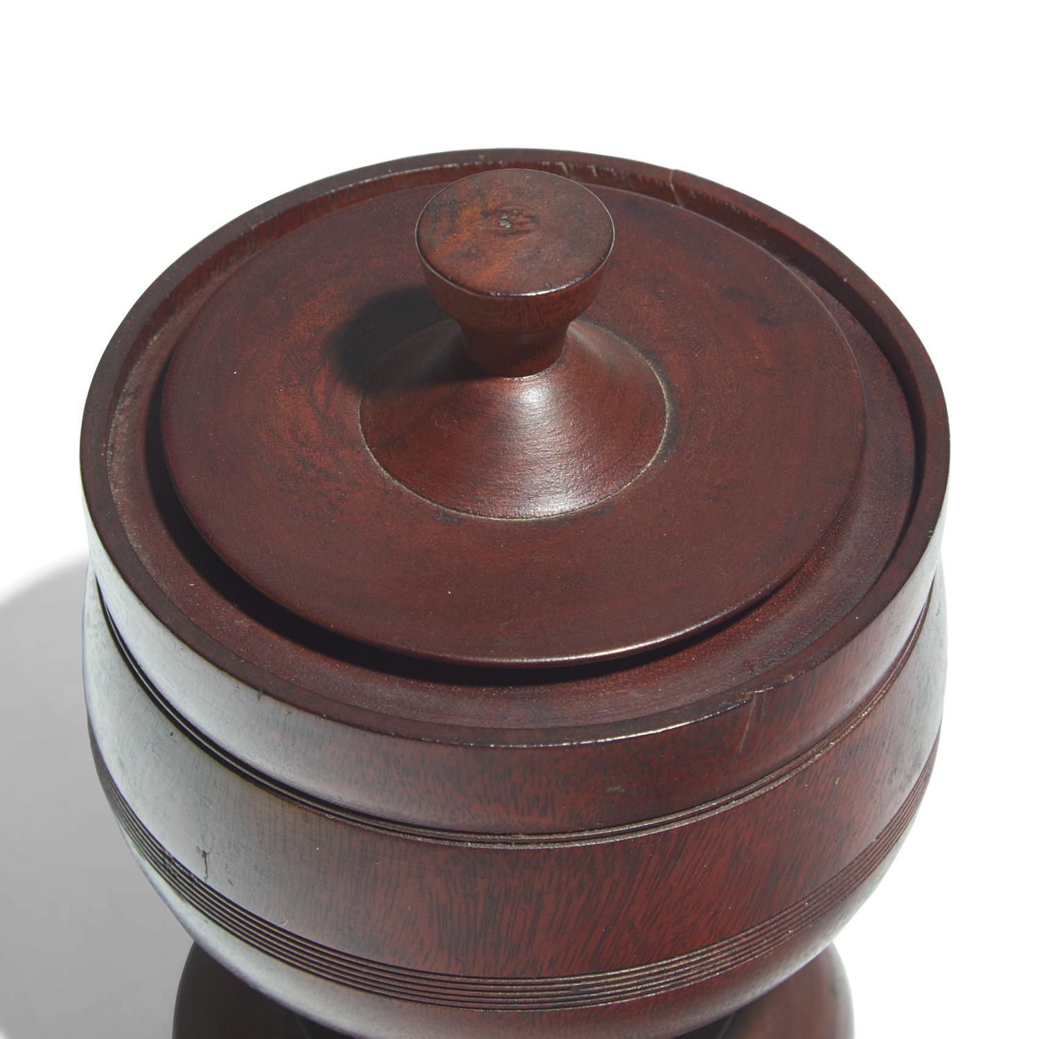 A Treenware Footed Bowl and Covered Urn