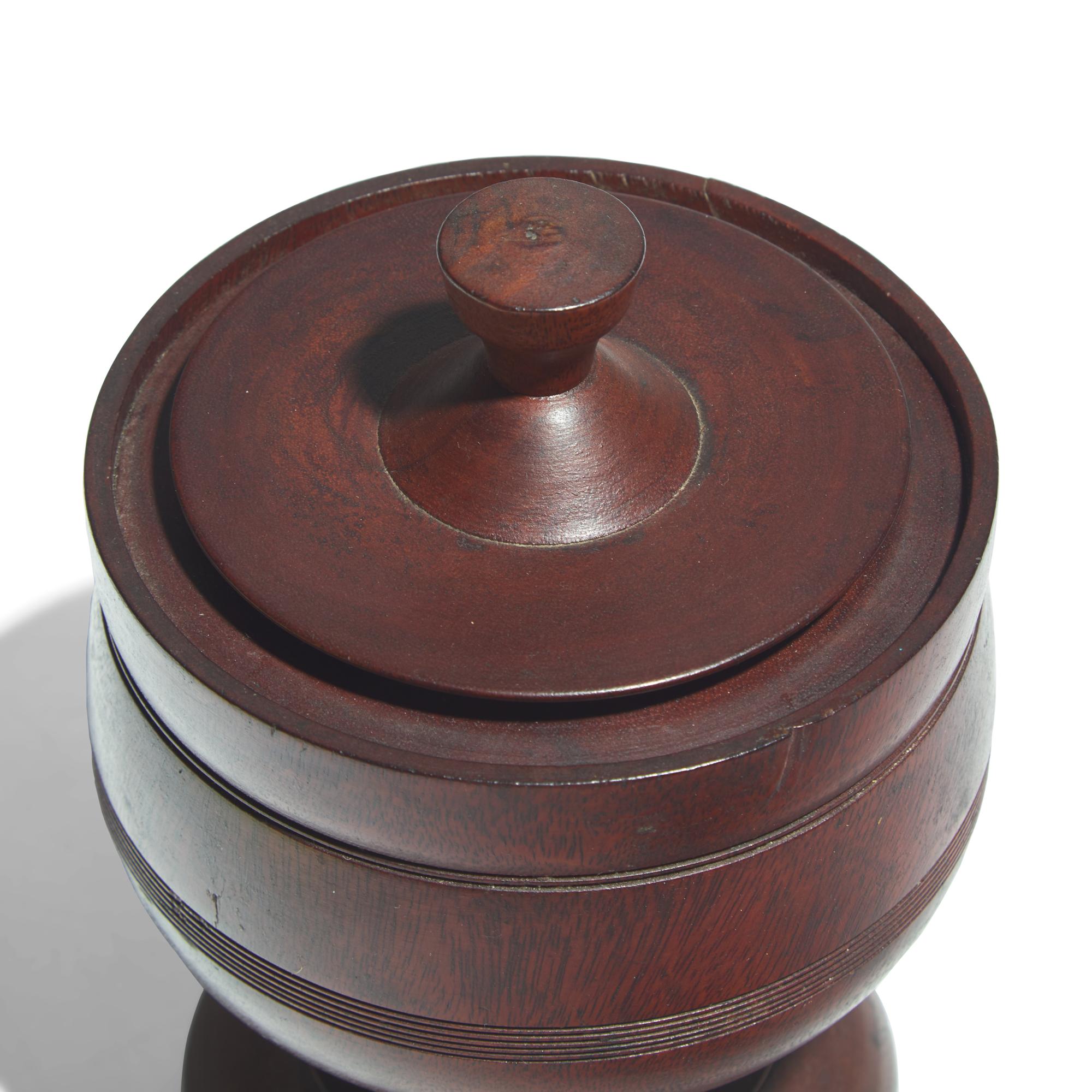 A Treenware Footed Bowl and Covered Urn