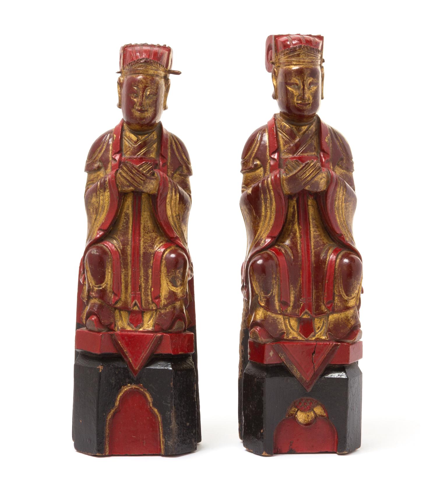 A Matched Pair of Gilt, Red and Black Lacquered Wood Figures of Scholars Height 11 7/8 inches.