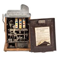 A Mills Novelty Co. 10 Cent Roman Head Slot Machine