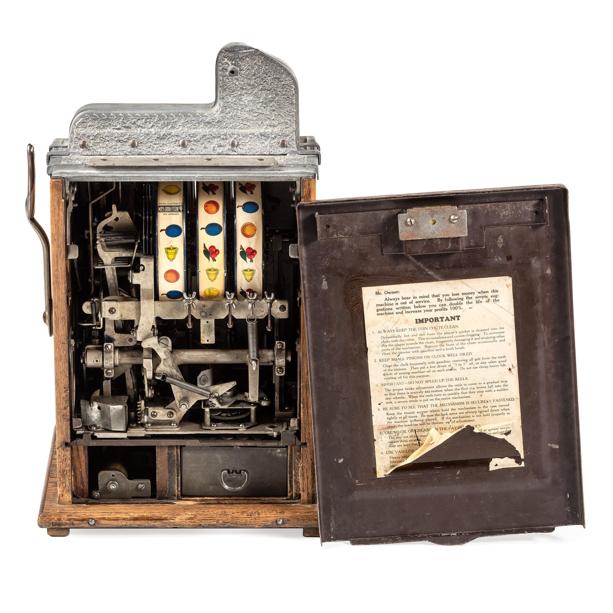 A Mills Novelty Co. 10 Cent Roman Head Slot Machine