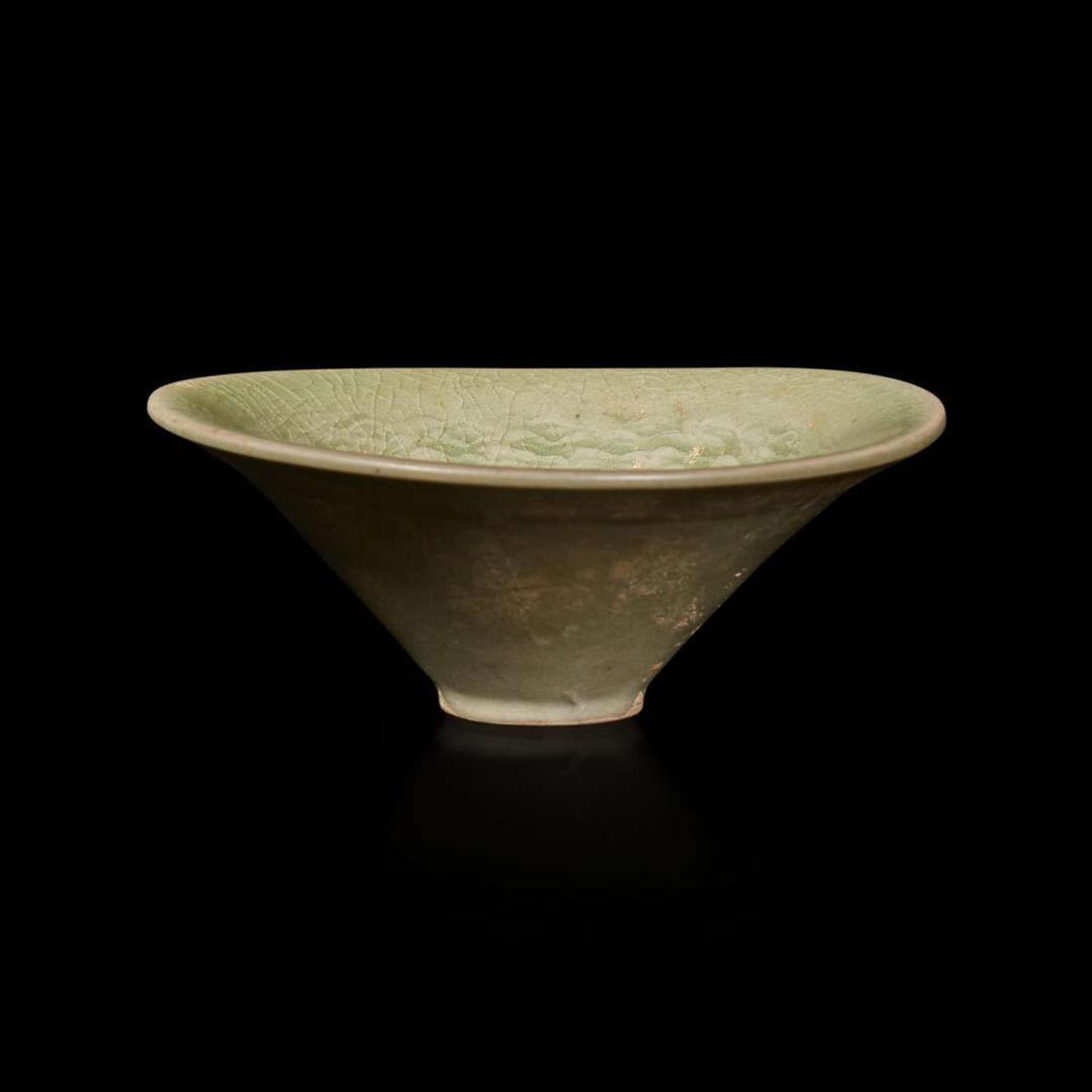 A small celadon-glazed molded conical bowl, Yaozhou 耀州窯斗笠盞 Possibly Song dynasty ????