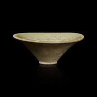 A small celadon-glazed molded conical bowl, Yaozhou 耀州窯斗笠盞 Possibly Song dynasty ????