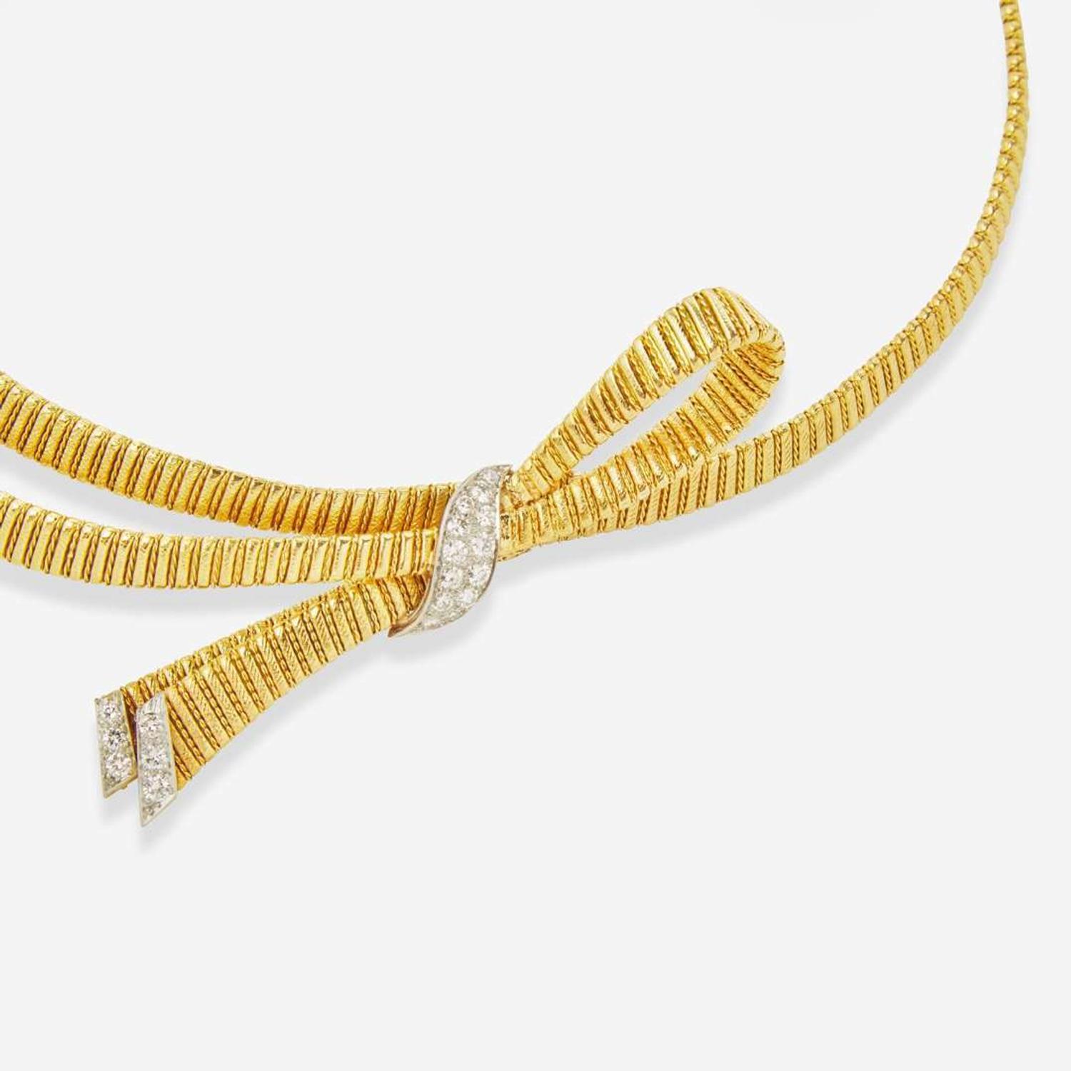 A 14K Yellow Gold and Diamond Necklace