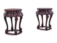 A Pair of Chinese Lacquered Hardwood Flori-Form Stools