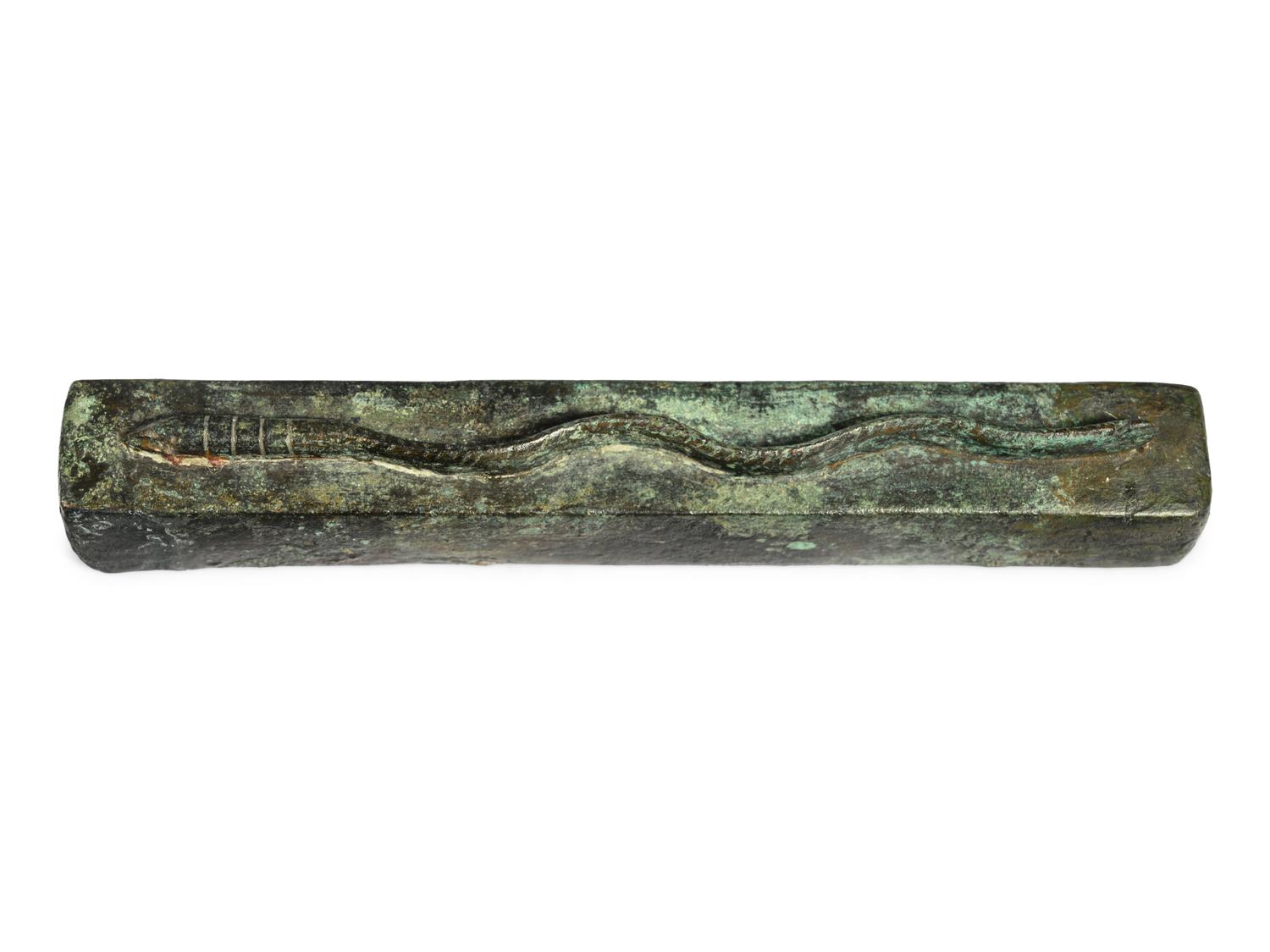 An Egyptian Bronze Snake Coffin
