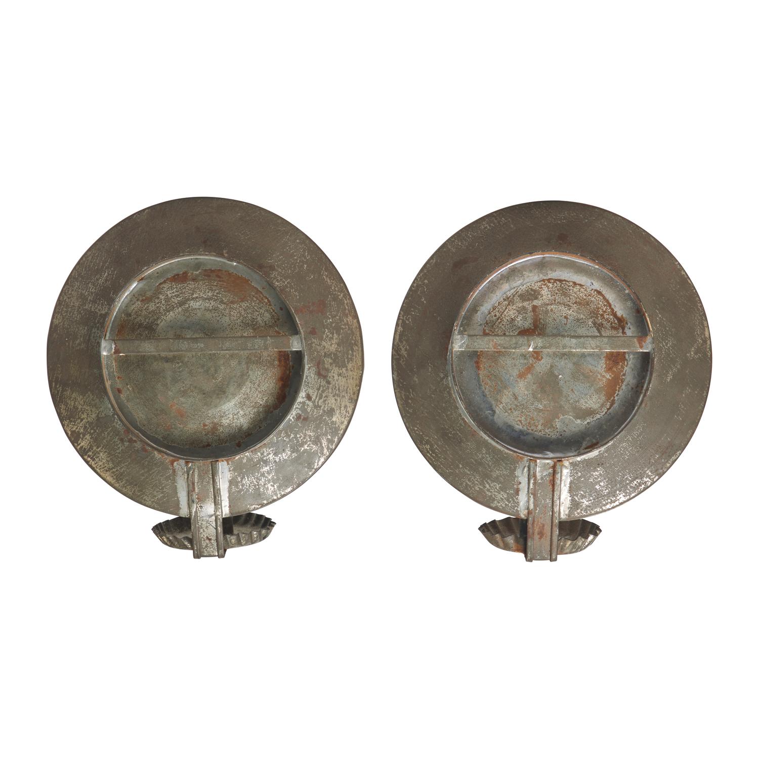 A Pair of Mirrored Tinware Sconces