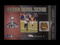A Danbury Mint Super Bowl NFL Flip Coin Collection Book