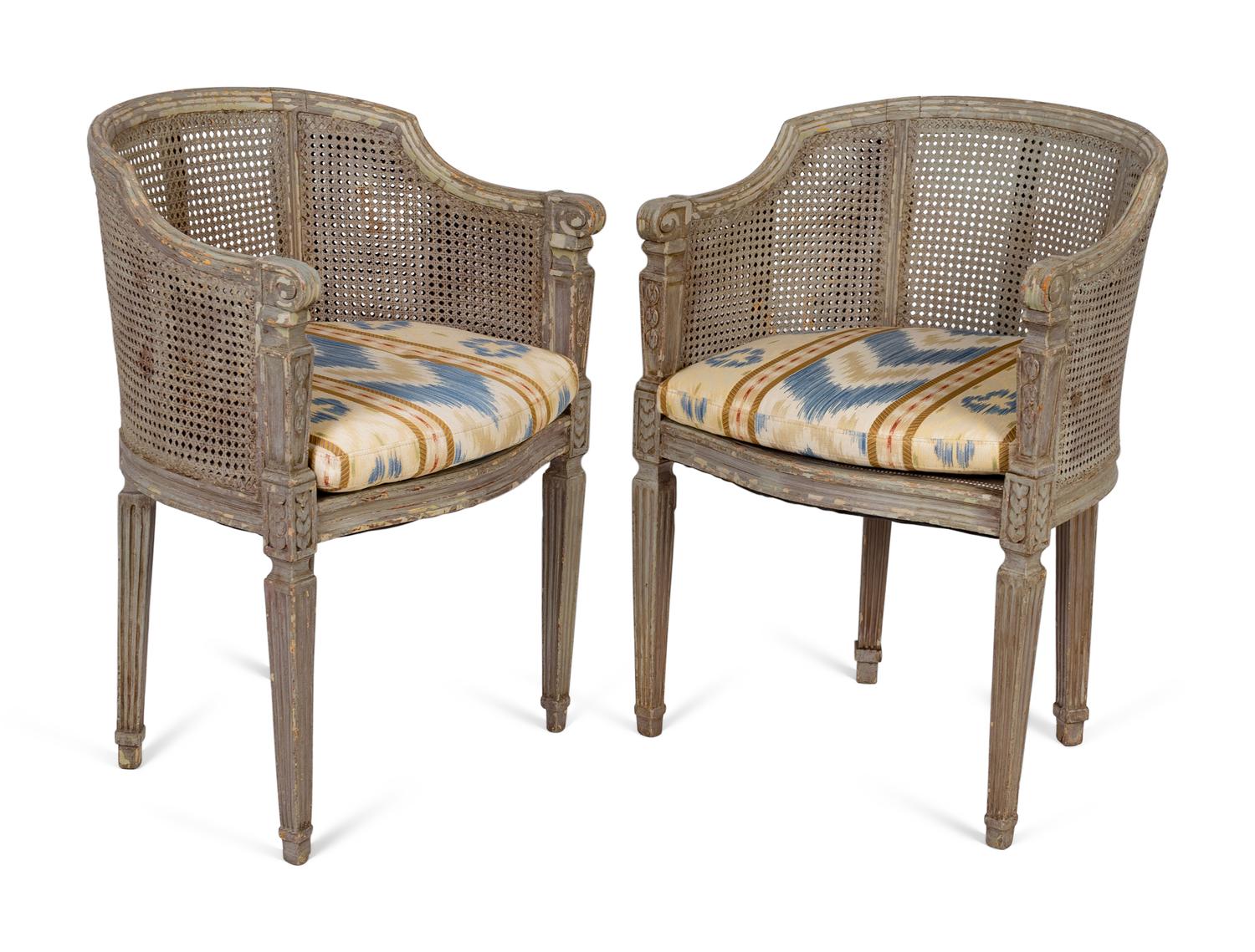 A Pair of Louis XVI Style Barrelback Cane and Painted Chairs — LATE 19TH CENTURY