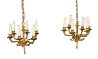 A Pair of Empire Gilt Bronze Six-Light Chandeliers