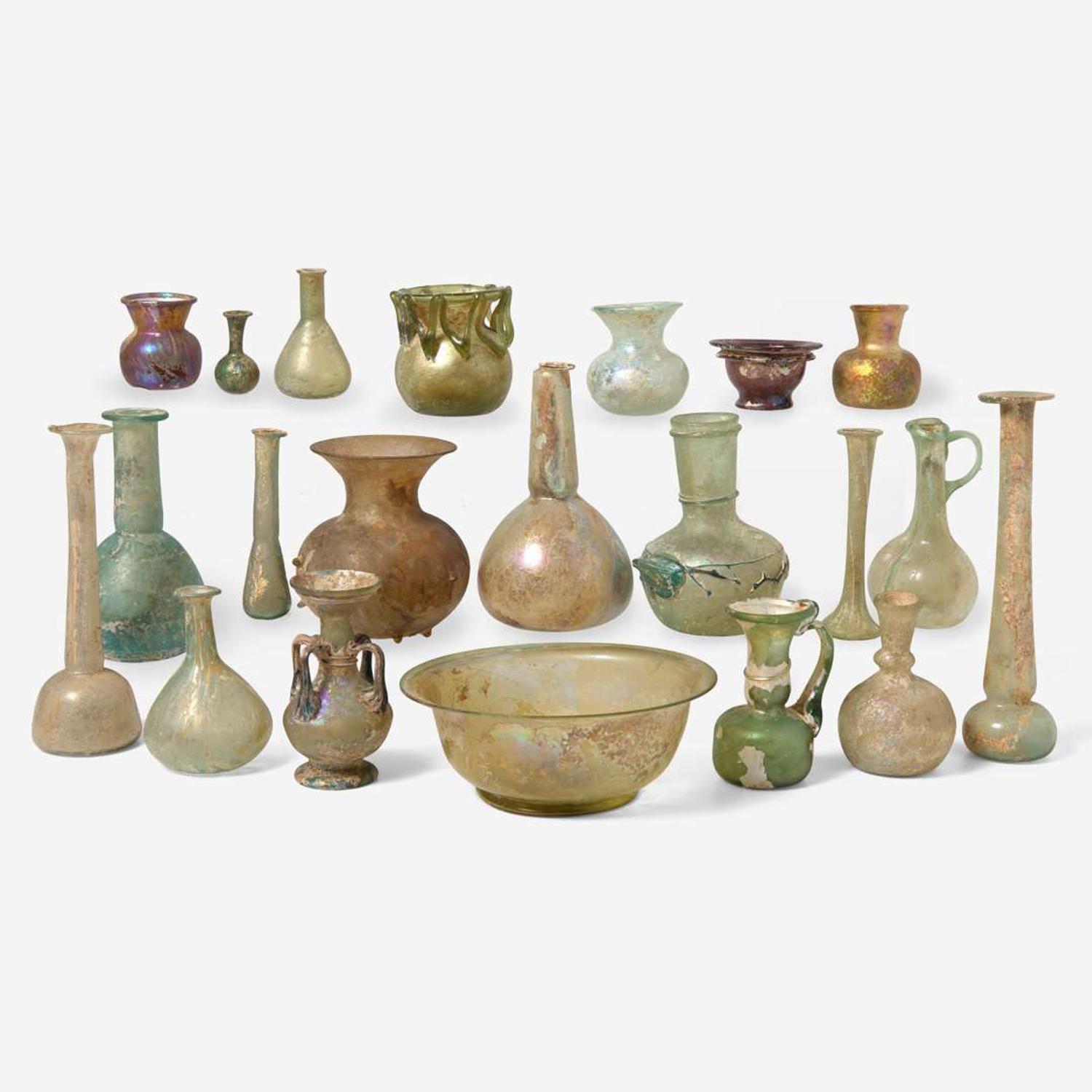 A collection of twenty-one Ancient Roman glass vessels 1st-4th century A.D.