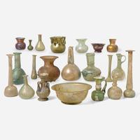 A collection of twenty-one Ancient Roman glass vessels 1st-4th century A.D.
