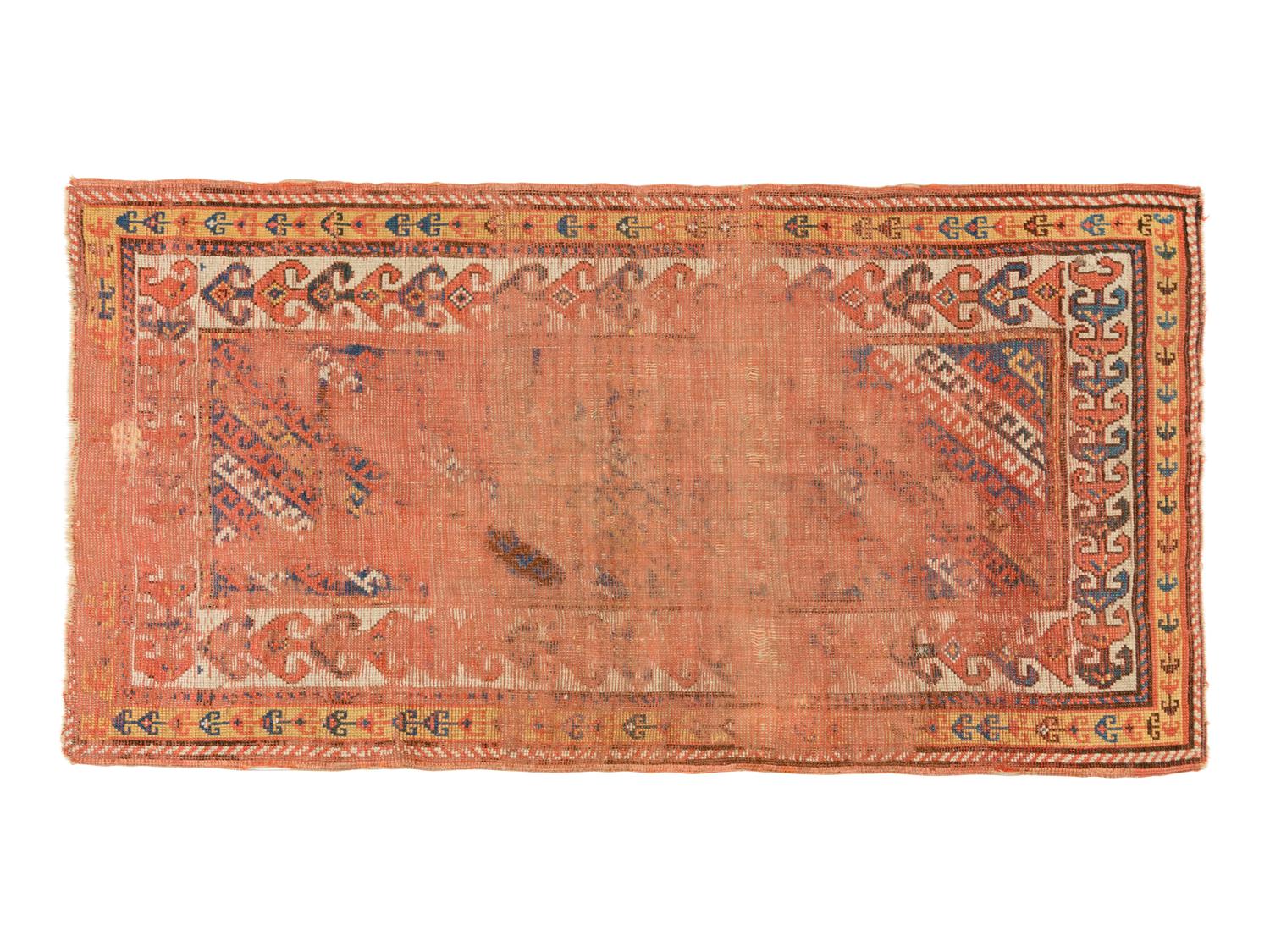A Kuba Wool Rug and a Kuba Wool Mat