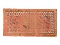 A Kuba Wool Rug and a Kuba Wool Mat