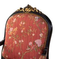 A Pair Louis XV Style Scalamandré Upholstered Parcel Gilt and Ebonized Fauteuils