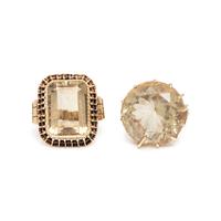 TWO CITRINE AND YELLOW GOLD RINGS