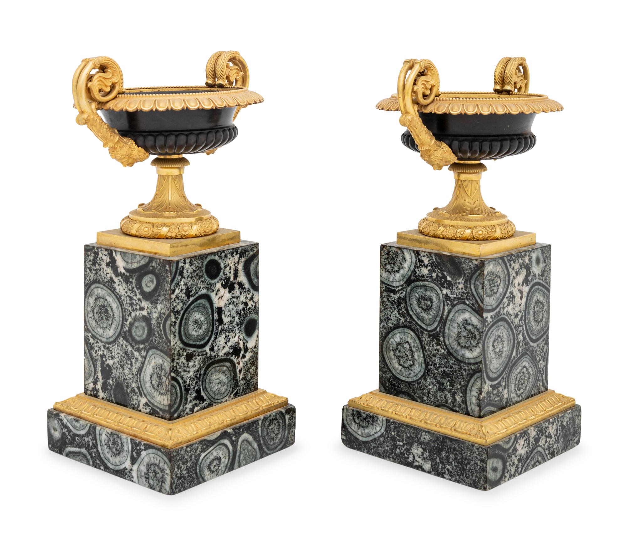 A Pair of Restauration Gilt and Patinated Bronze and Granite Urns