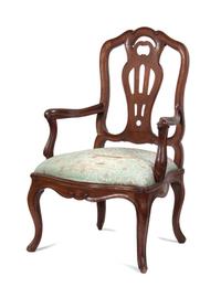 An Italian Walnut Armchair Height 41 3/4 inches.