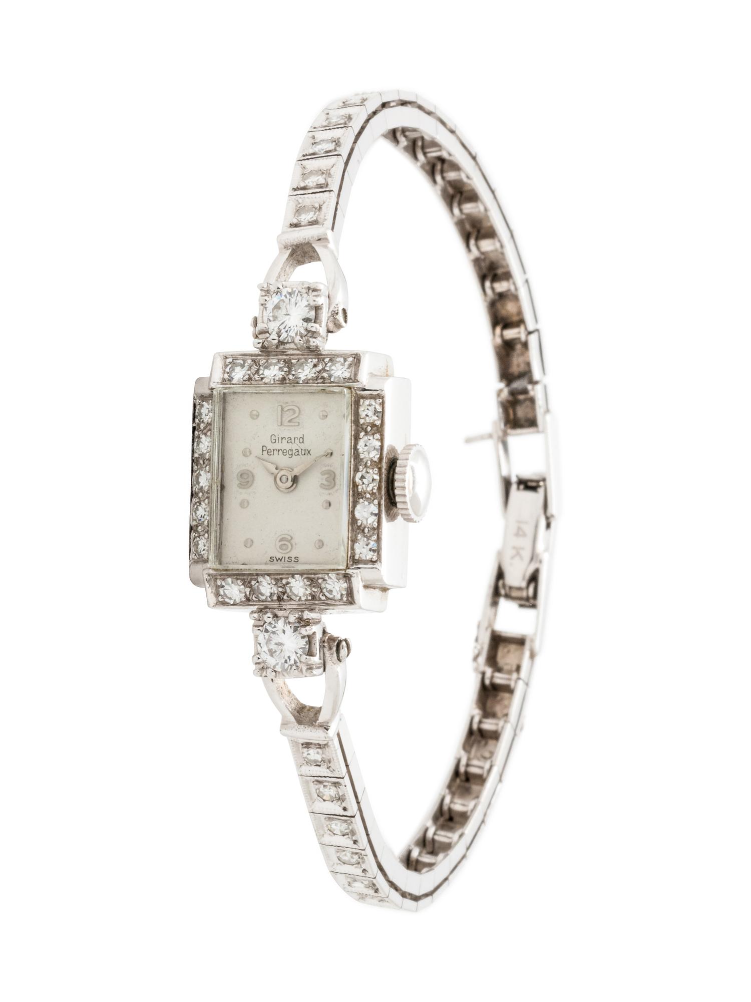 GIRARD-PERREGAUX, PLATINUM AND DIAMOND WRISTWATCH