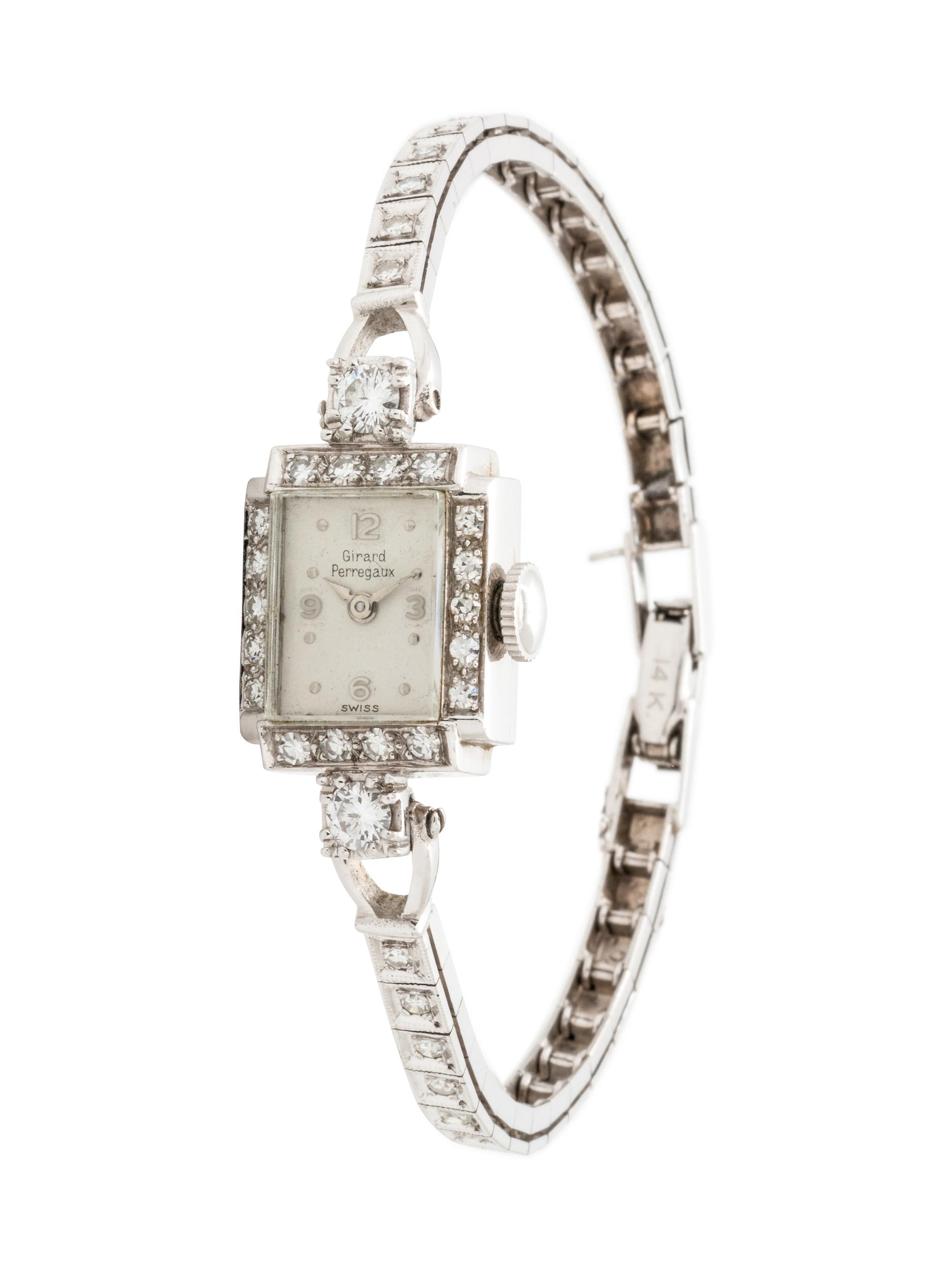 GIRARD-PERREGAUX, PLATINUM AND DIAMOND WRISTWATCH