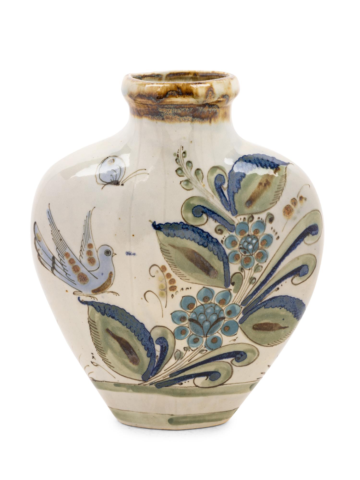 A Mexican Glazed Terra Cotta Vase