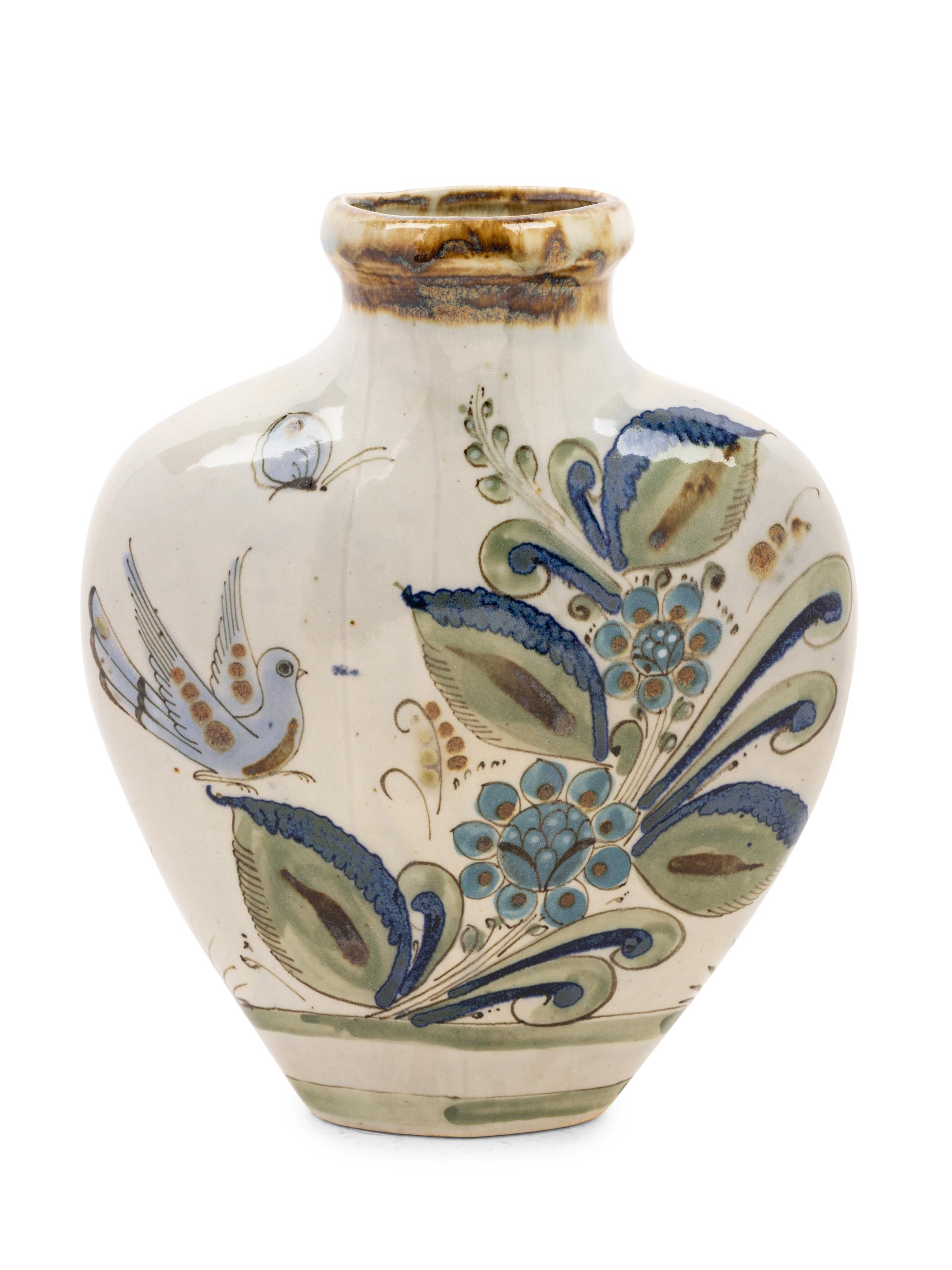 A Mexican Glazed Terra Cotta Vase