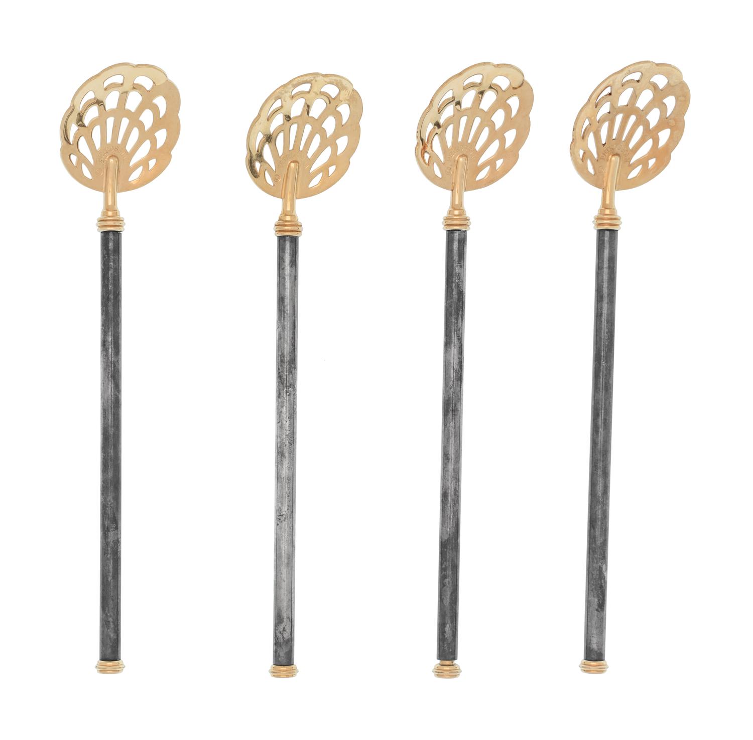A Group of Petrossian Gold- and Silver-Plate Pierced Caviar Spoons