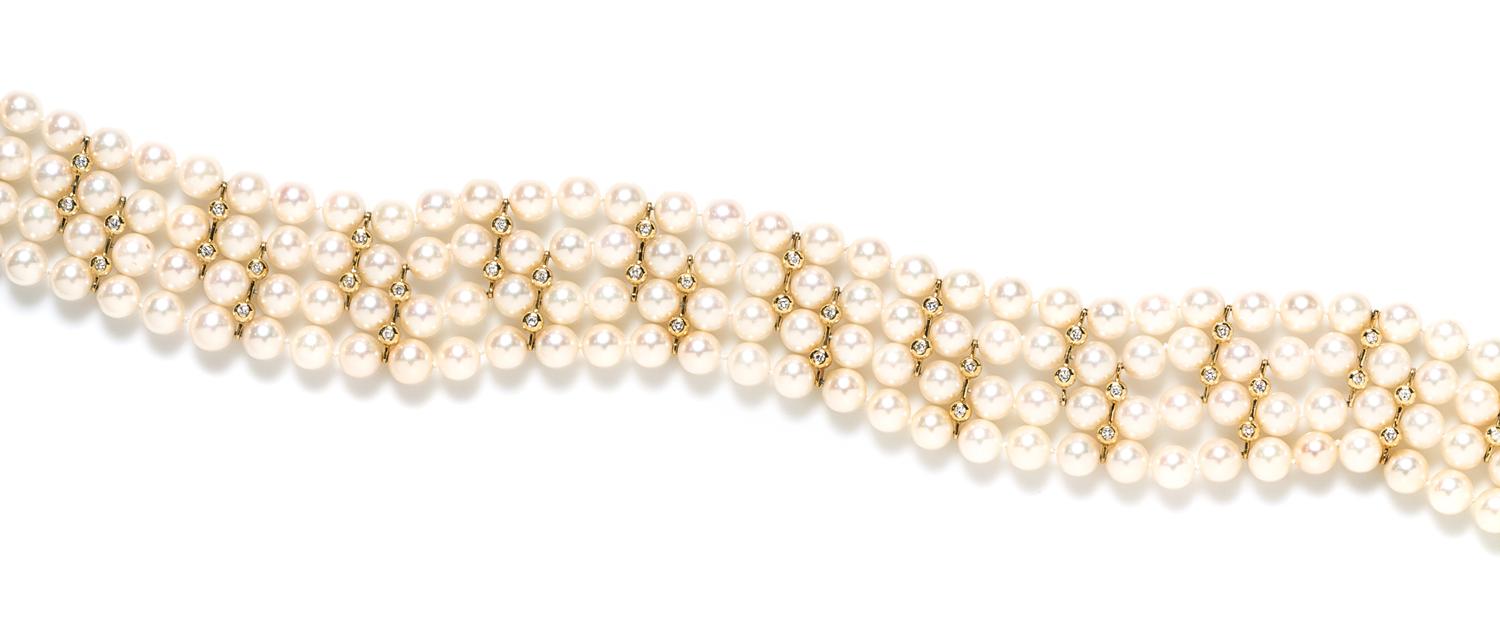An 18 Karat Yellow Gold, Cultured Pearl and Diamond Multistrand Necklace,