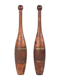 A Pair of Spalding 3Lb. Turned and Parcel Gilt Cherrywood Juggler's Pins
