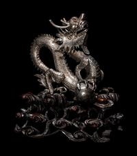 A Chinese Silver Dragon