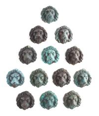 A Group of Bronze Appliques Each 4 x 4 inches. — 20TH CENTURY