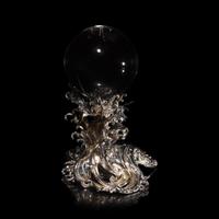 A Japanese Rock Crystal Sphere and Silver 'Dragon and Waves' Stand, Signed Yoshimasa Saku Meiji/Taisho Period 日本明治/大正時期 義正作潮を支配する珠と龍