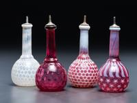Four Glass Barber Bottles