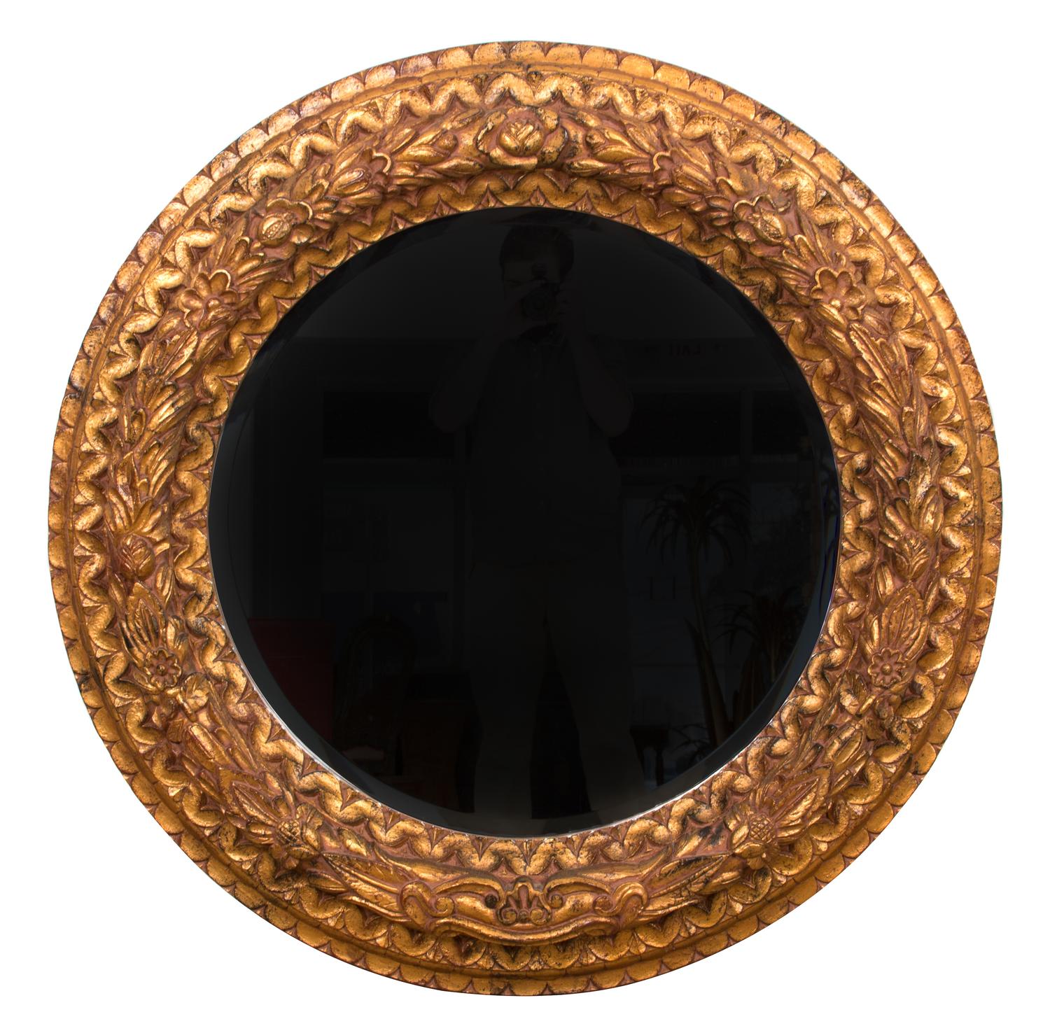 A Pair of Rococo Revival Carved Giltwood Mirrors Diameter 47 inches. — 20TH CENTURY