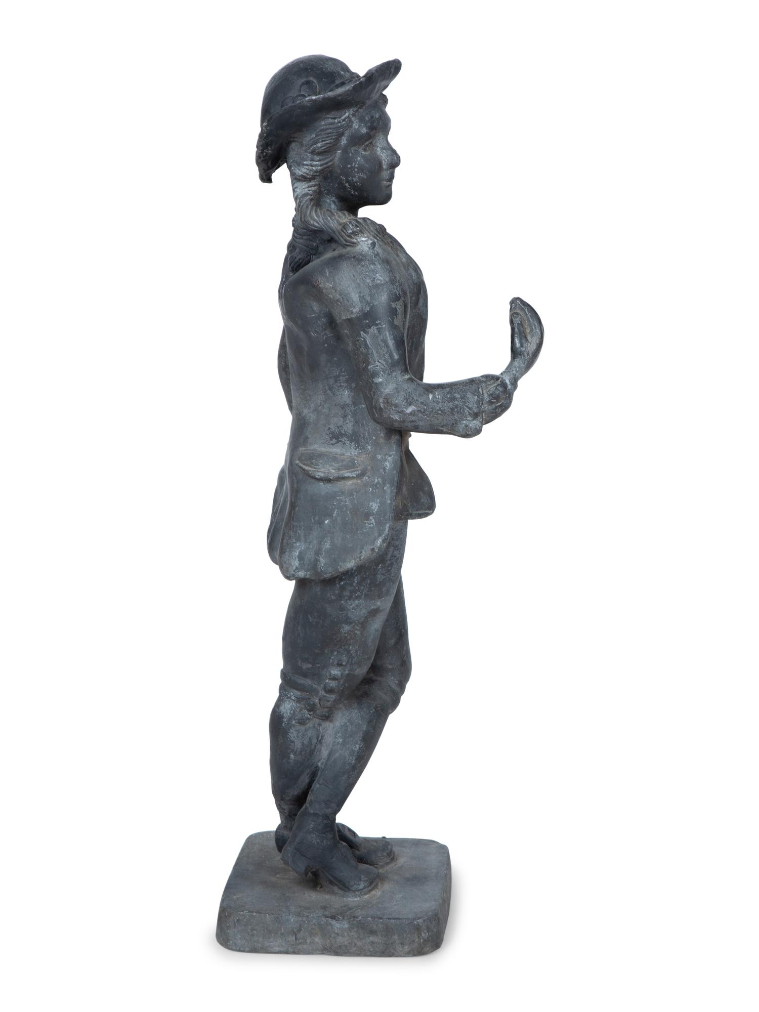A Cast Lead Garden Figure — EARLY 20TH CENTURY