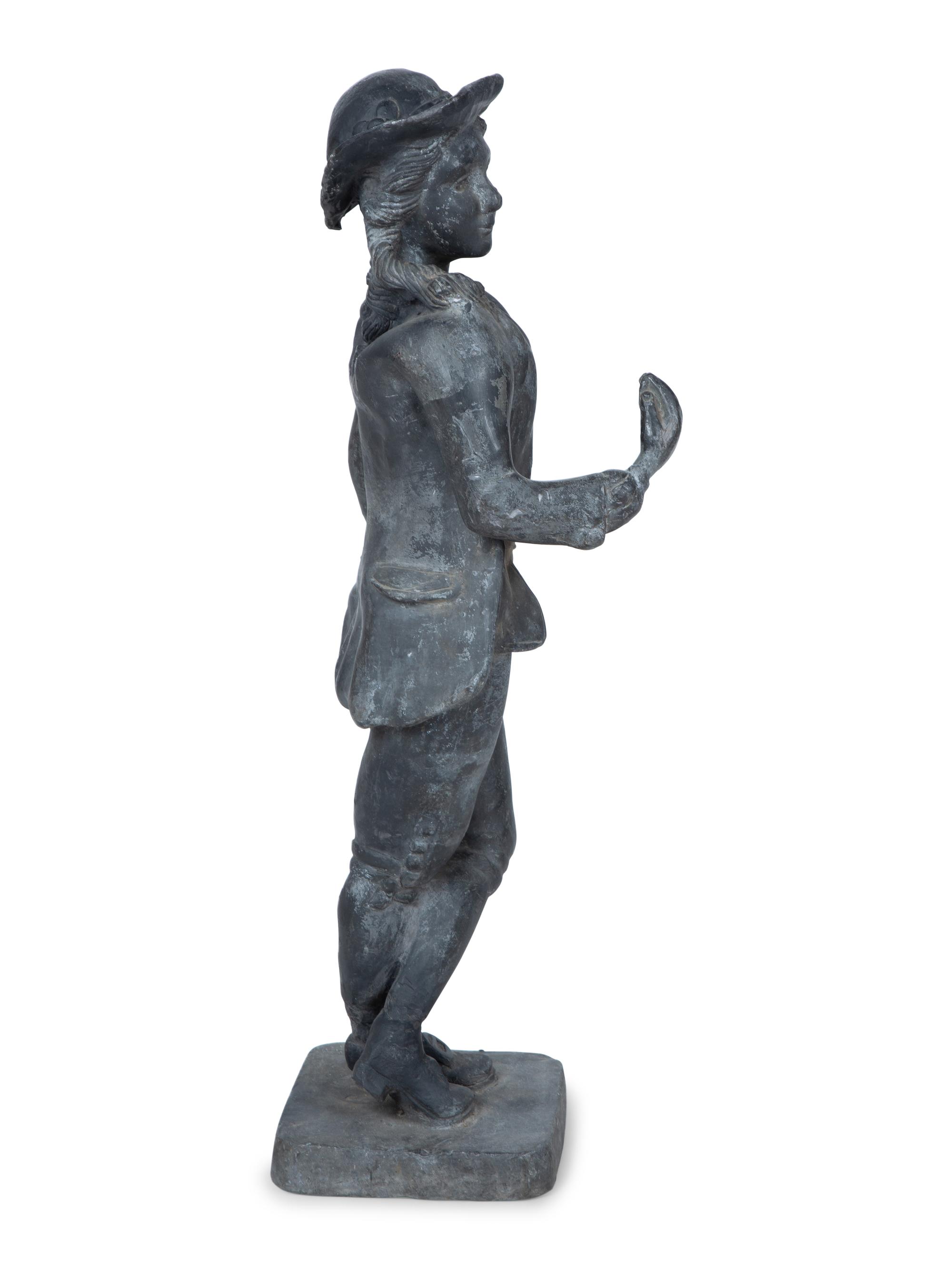 A Cast Lead Garden Figure — EARLY 20TH CENTURY